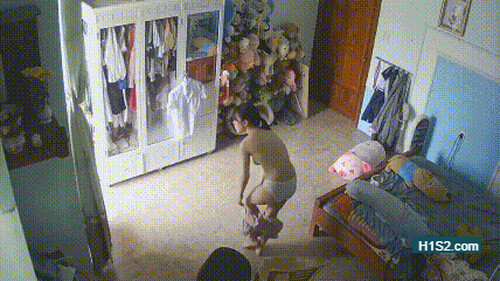 Home camera peeks at beautiful girl changing clothes