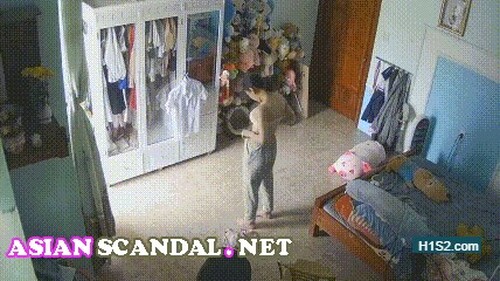 Home camera peeks at beautiful girl changing clothes